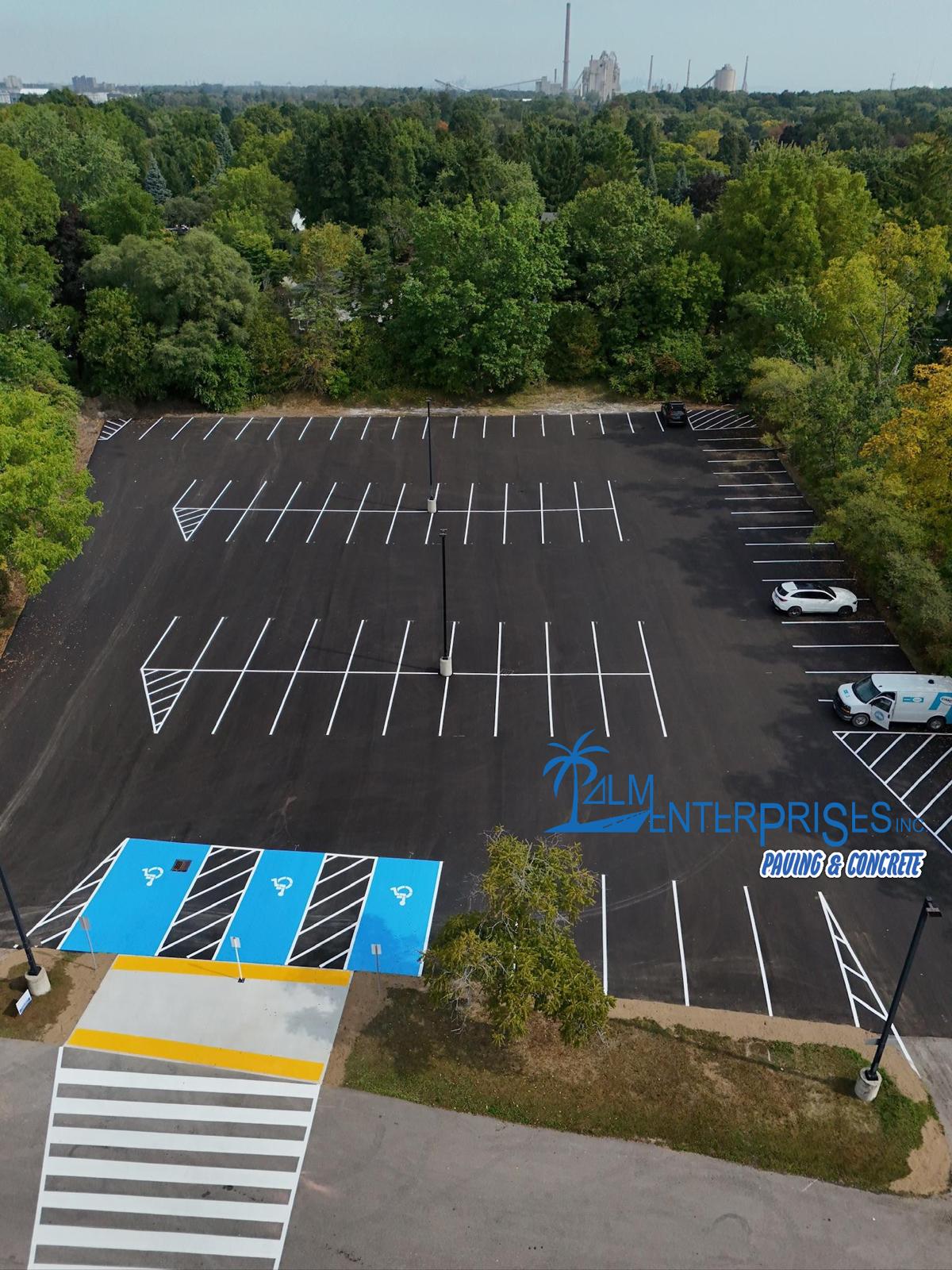 Commercial parking lot asphalt paving with professional line striping