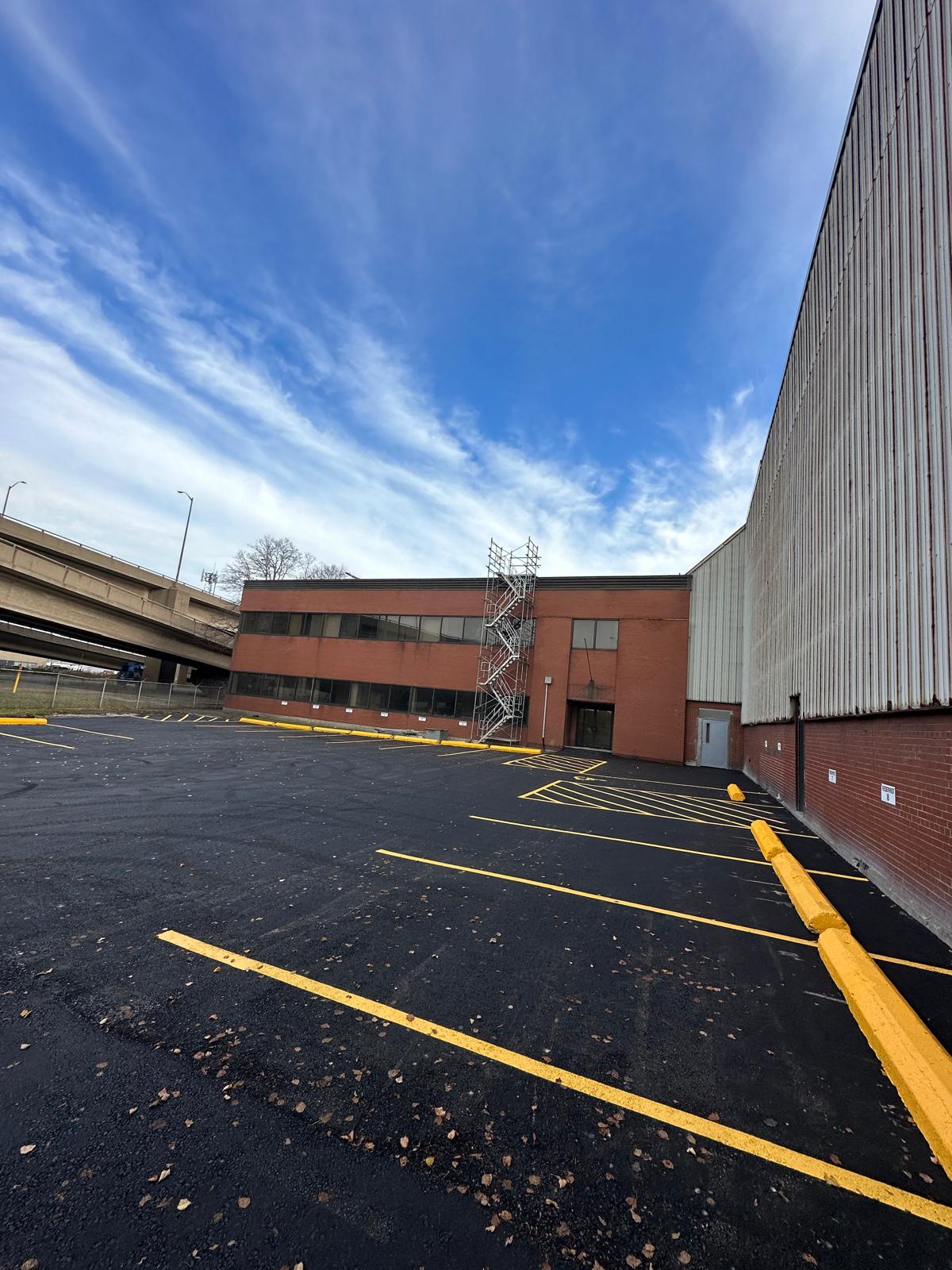 Industrial Parking Lot with Yellow Lines