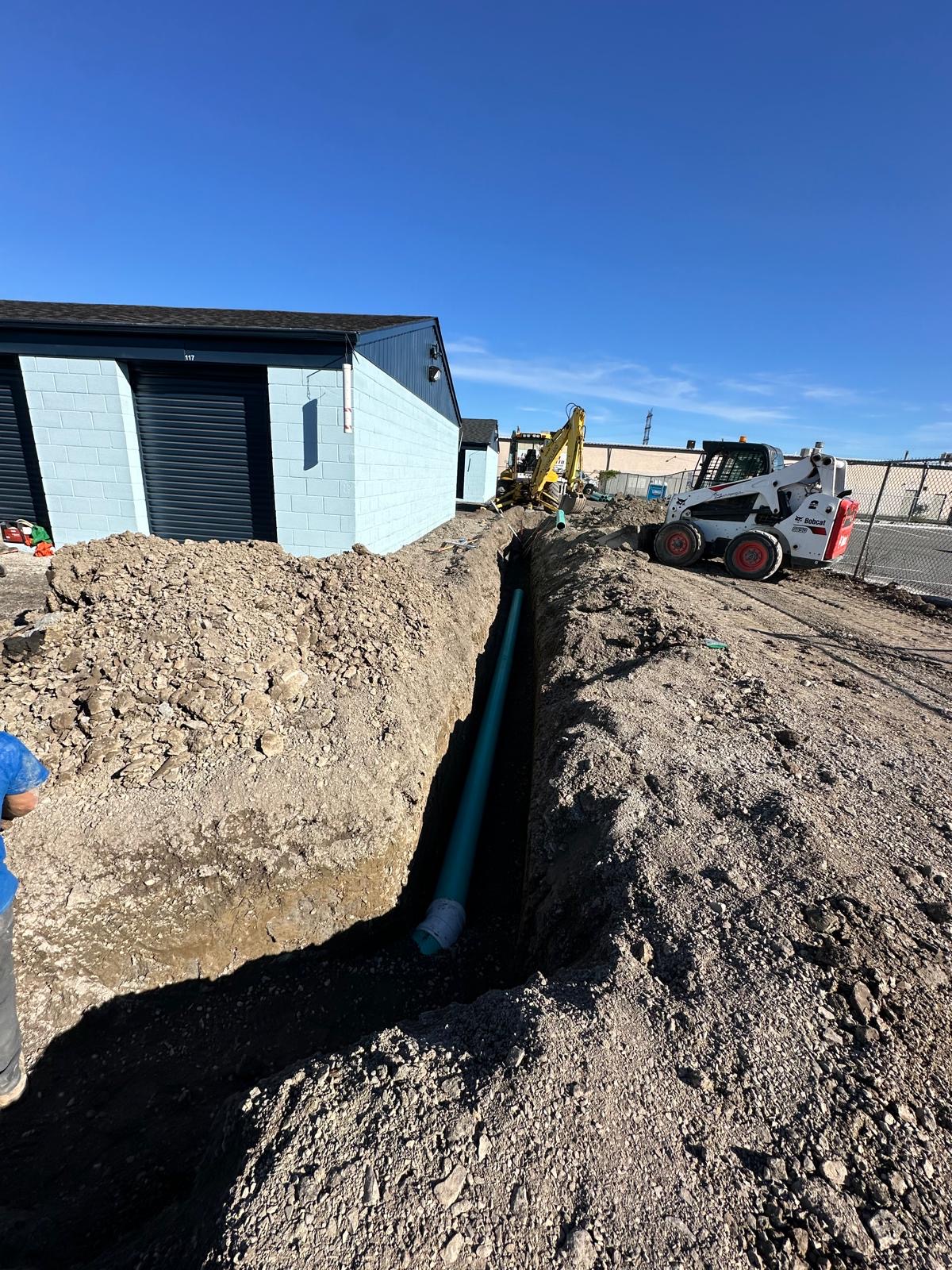 Skid Steer Excavation with Logo