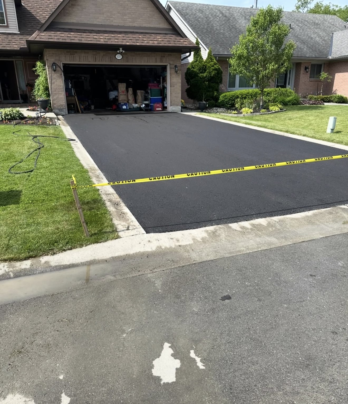Residential driveway asphalt paving